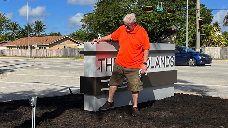 New Community Sign Unveiled After Damage and Multiple Hits by Cars