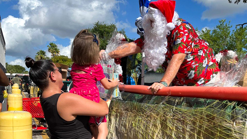Broward Sheriff’s Office in North Lauderdale Holds ‘Christmas in July’ Event