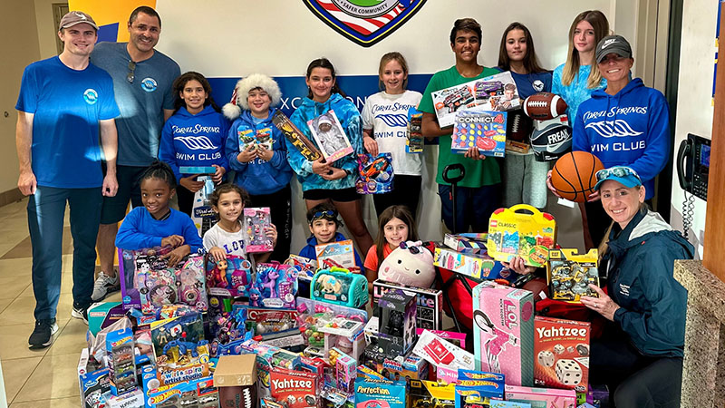 Coral Springs Swim Club Donates Over 120 Toys for Children